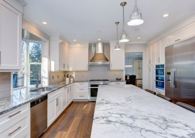 luxury kitchen with white marble countertops